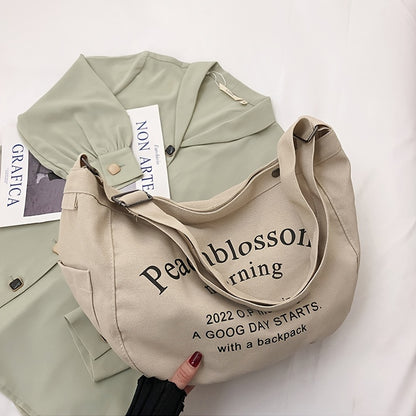 レター柄 キャンバス ホーボーバッグ ファッション 大容量 ショルダーバッグ カジュアル クロスボディ レディース